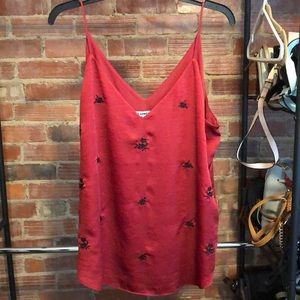 Red tank with black flowers